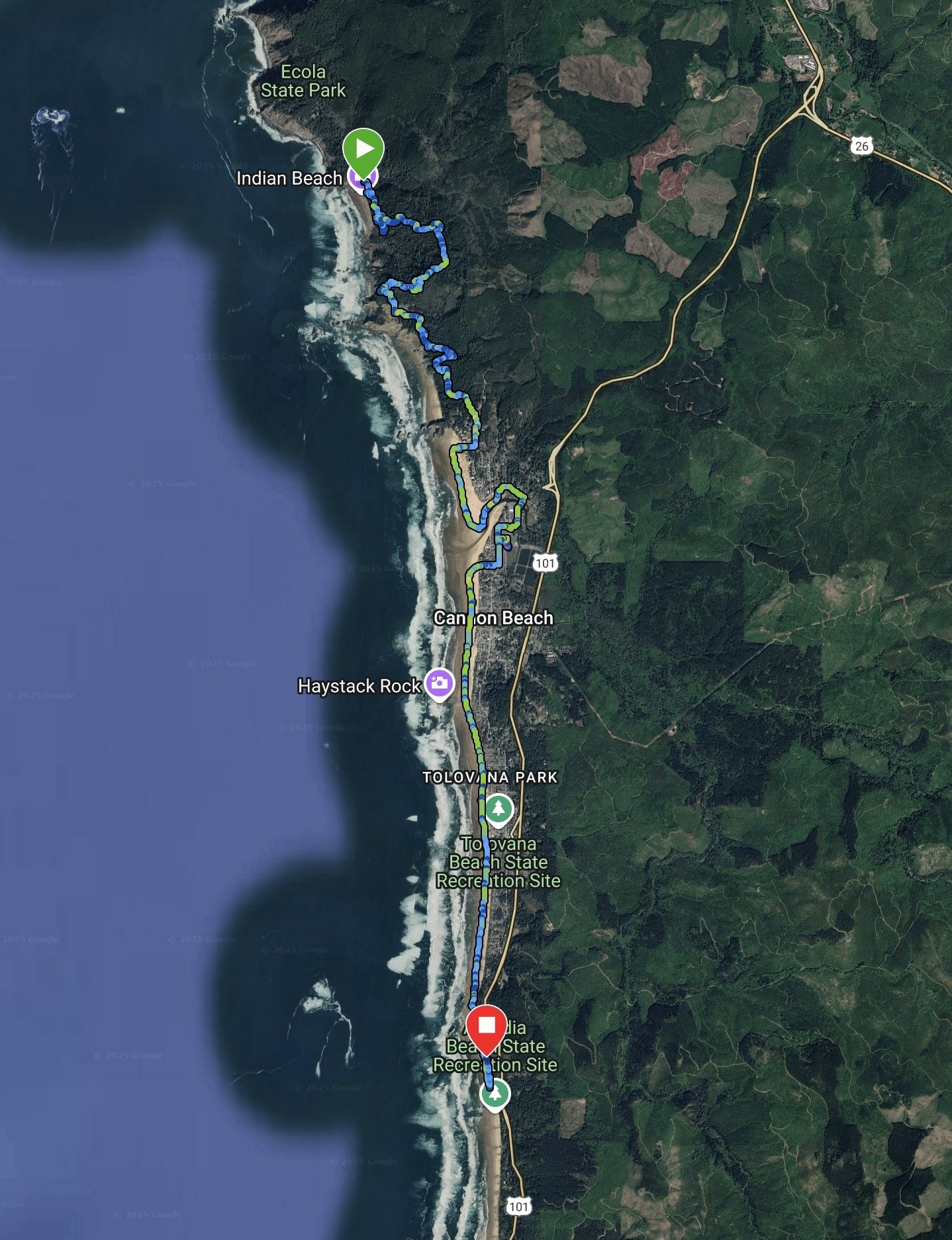 Satellite map showing a GPS trail along the Oregon Coast Trail from Indian Beach through Ecola State Park to Arcadia Beach State Recreation Site, passing through Cannon Beach and near Haystack Rock.